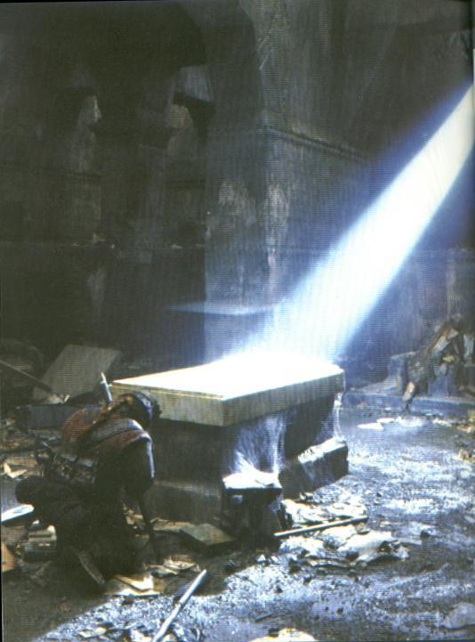 Gimli arrodillado frente a la tumba de Balin