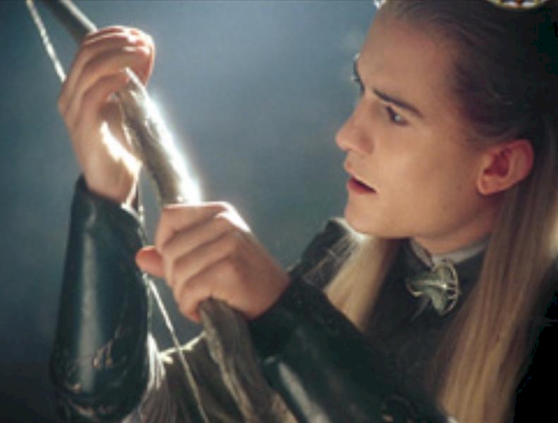Legolas con el arco regalado por los elfos